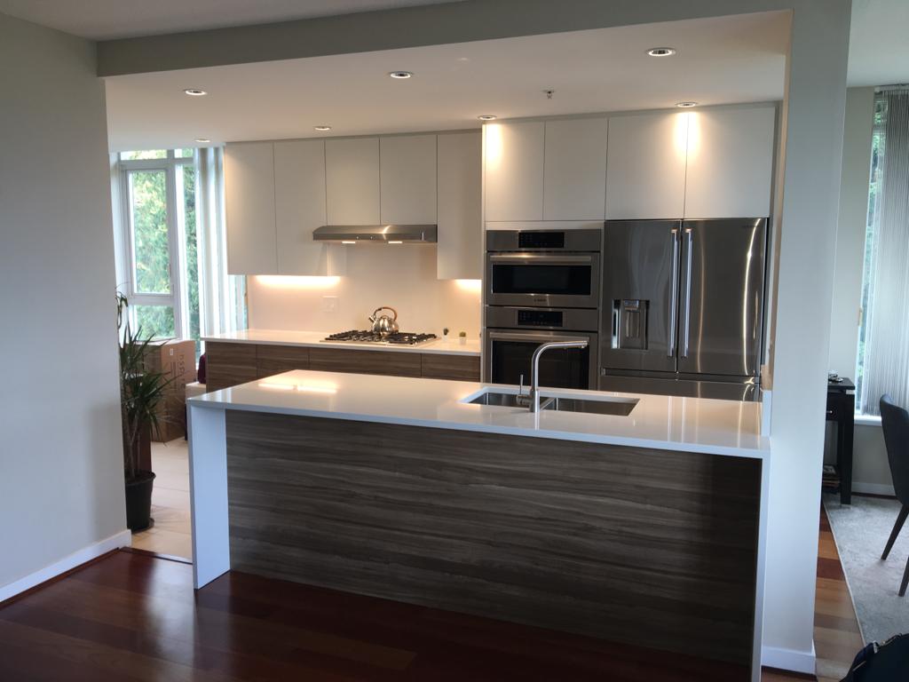 Picture of a full modern kitchen with white cabinets